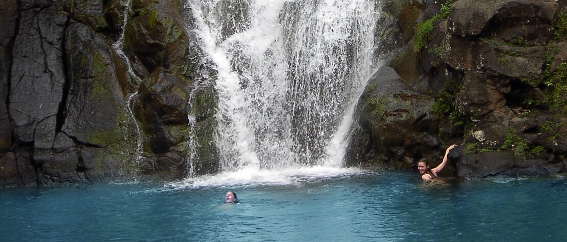 Waimea Waterfall in Waimea Valley Arboretum, Oahu's most comprehensive Ultimate Circle Island Tour with Oahu Nature Tours